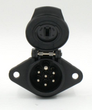Front view of the 7-pin ISO 1185 trailer socket showing the two-hole mounting flange and 24N pin layout